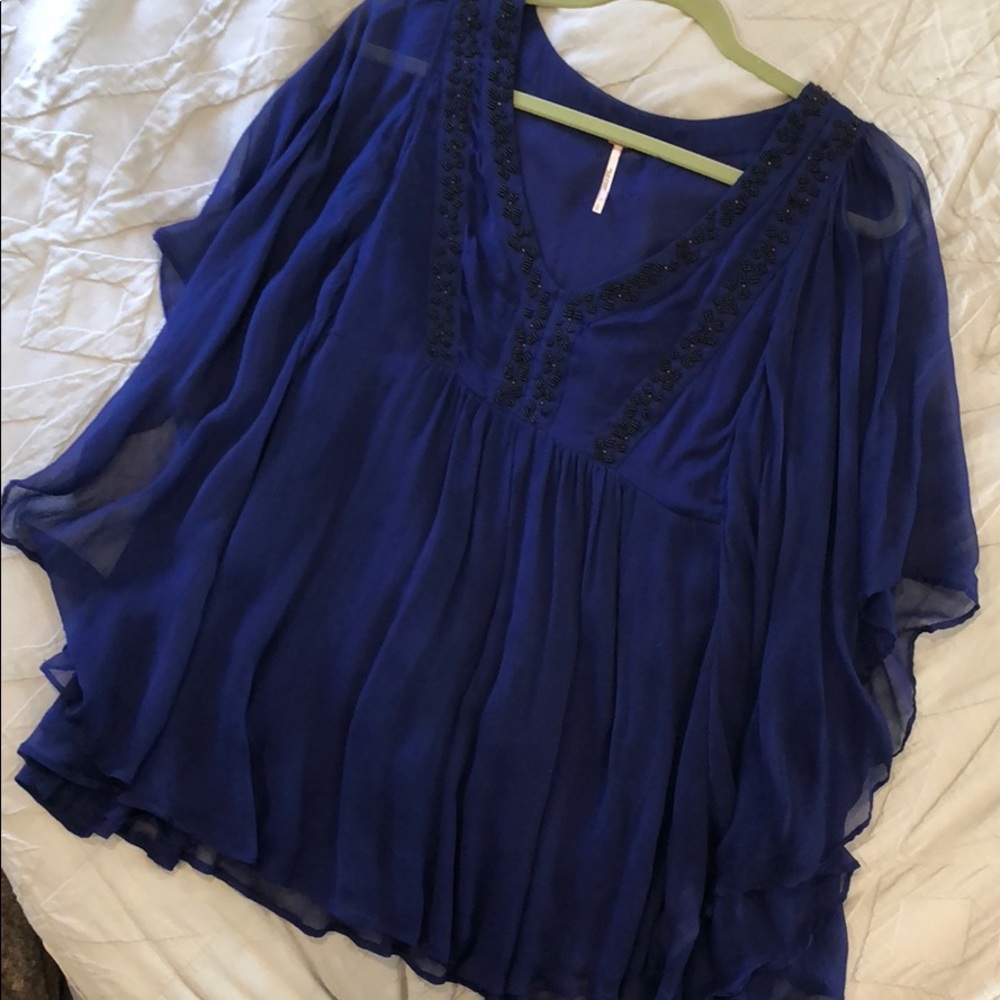 Sheer, beaded blouse